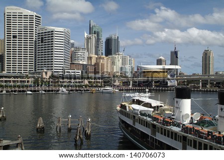 SYDNEY, AUSTRALIA - APRIL 11: Darling Harbor - a waterfront entertainment area includes restaurants, pubs, cafes. A preferred destination for day and night entertainment, on April 11, 2009 in Sydney