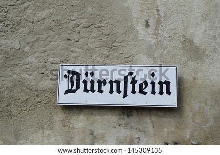 Austria, plate with name of the village in old letters of the Unesco World Heritage site of Duernstein in Danube valley