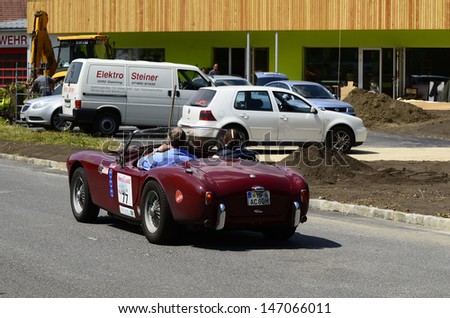 LUNZ, AUSTRIA - JULY 19: AC Ace on special stage by International Ennstal Classic 2013, a yearly tournament through Austria for vintage cars on July 19, 2013, in Lunz am See, Austria