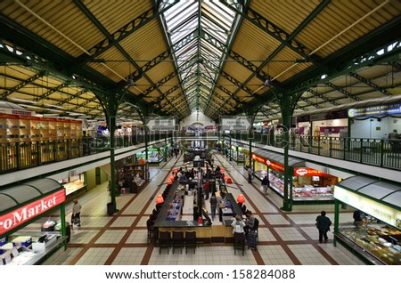 SOFIA, BULGARIA - SEPTEMBER 28: Unidentified people and different shops in the central Sofia market hall, named the market - a covered market in the centre on September 28, 2013 in Sofia, Bulgaria