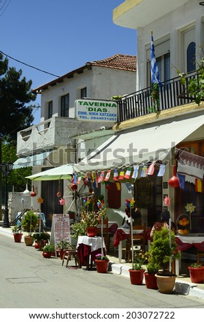 LASSITHI, GREECE - MAY 23: Typical small street tavern in a tiny village on Lassithi Plateau in Crete, on May 23, 2014 in Lassithi, Greece