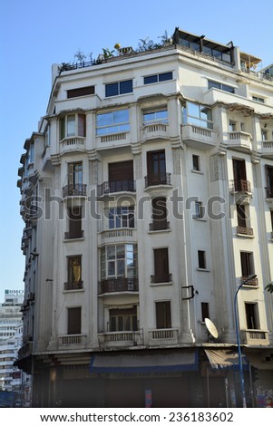 CASABLANCA, MOROCCO - NOVEMBER 18: Building in a main street of Casablanca with balconies and roof garden, on November 18, 2014 in Casablanca, Morocco