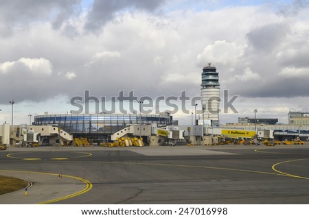 VIENNA, AUSTRIA - JANUARY 14: Docking station, terminal and new tower on the Vienna Airport in Schwechat, on January 14, 2012 in Vienna, Austria