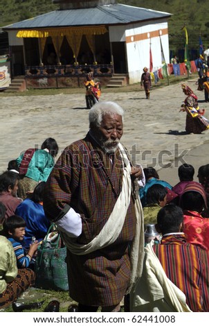 HAA, BHUTAN - SEPTEMBER 21: unknown spectators by religious festival named Tshechu in Haa, Western Bhutan, in the White Temple -Karpho Lhakhang- on September 21, 2007 in Haa Village in Bhutan