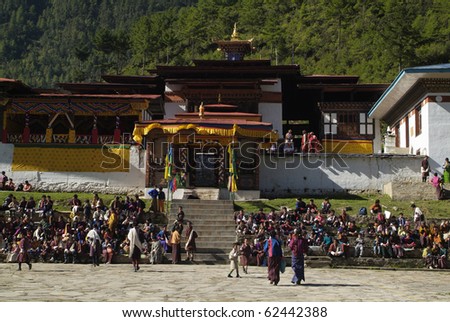 HAA, BHUTAN - SEPTEMBER 21: unknown spectators by religious festival named Tshechu in Haa, Western Bhutan, in the White Temple -Karpho Lhakhang- on September 21, 2007 in Ha