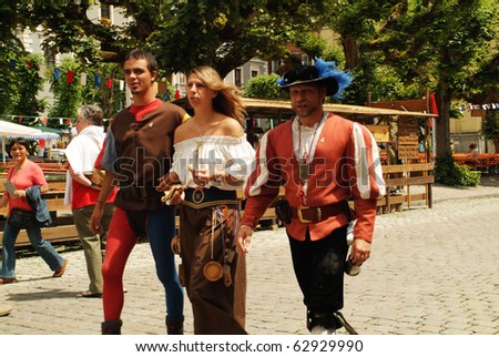 NEUBURG, GERMANY - JULY 3: unknown spectators and actors by ancient city festival on July 03, 2005 in Neuburg on Danube, Bavaria, Germany