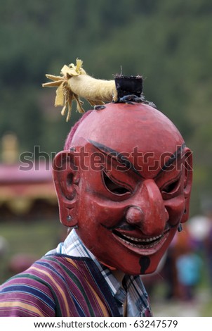 HAA, BHUTAN - SEPTEMBER 21: unknown  dancer with masks at the religous festival named Tshechu in the White Temple (Karpho Lhakhang) on September 21, 2007 in Haa, Bhutan