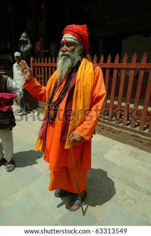 KATHMANDU, NEPAL, JULY 14, unknown holy man on durban place on July 14, 2004 in Kathmandu, Nepal