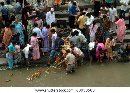 PASHUPATINATH, NEPAL, JULY 15, unknown people by burial ceremony on July 15, 2004 in Pashupatinath, Nepal