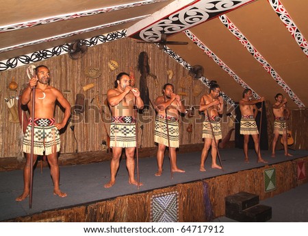 ROTORUA, NEW ZEALAND - MARCH 12: unidentified Maori warriors with tattoos and traditional clothes by Maori war dance exhibition on March 12, 2005 in Rotorua, New Zealand