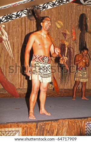 ROTORUA, NEW ZEALAND - MARCH 12: unidentified Maori warrior with tattoo and traditional clothes by Maori War Dance Exhibition on March 12, 2005 in Rotorua, New Zealand