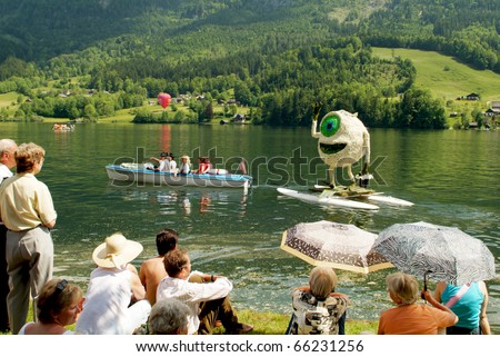 BAD AUSSEE, AUSTRIA - MAY 30: unidentified actors and spectators by Narcissus Festival on Grundlsee (Lake) on May 30, 2005 in Bad Aussee in Styria, Austria