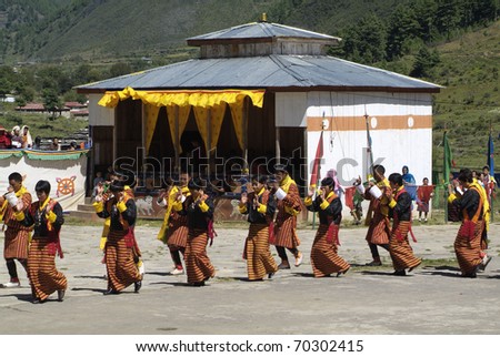 HAA-VALLEY, BHUTAN - SEPTEMBER 21: unidentified dancers by Zhungdra-Dance at religious festival named Tshechu in Haa, in the White Temple (Karpho Lhakhang) on September 21, 2007 in Haa-Valley, Bhutan