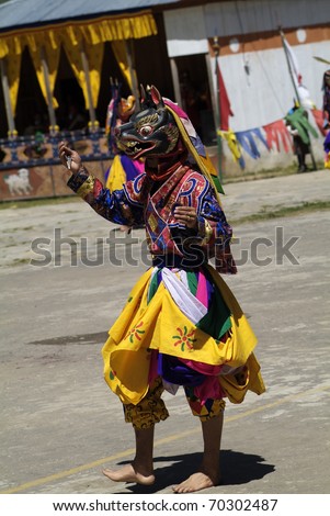 HAA-VALLEY, BHUTAN - SEPTEMBER 21: unidentified dancer with sacred mask by religious festival named Tshechu in Haa, in the White Temple (Karpho Lhakhang) on September 21, 2007 in Haa-Valley, Bhutan