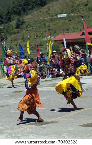 HAA-VALLEY, BHUTAN - SEPTEMBER 21: unidentified dancers and spectators by religious festival named Tshechu in Haa, in the White Temple (Karpho Lhakhang) on September 21, 2007 in Haa-Valley, Bhutan