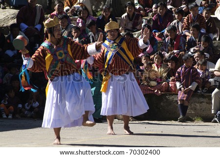 HAA-VALLEY, BHUTAN - SEPTEMBER 21: unidentified dancers and spectators by religious festival named Tshechu in Haa, in the White Temple (Karpho Lhakhang) on September 21, 2007 in Haa-Valley, Bhutan
