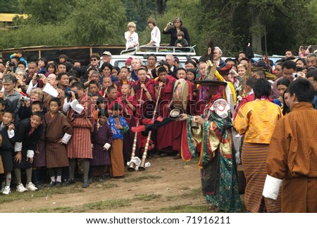 JAKAR (CHAKAR); BHUTAN - SEPT 26: Unidentified people and monks attend a traditional religious smoke and fire ceremony at Thangbi Lhakhang on September 26, 2007 in Jakar (Chakhar), Bhutan.