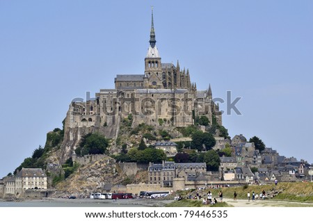 MONT SAINT MICHEL, FRANCE - JUNE 04: abbey on the border between Normandy and Brittany an UNESCO World Heritage monument and well known tourist attraction on June 04, 2011 in Mt. St. Michel, France
