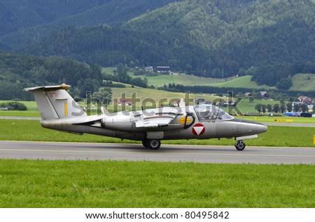 ZELTWEG, AUSTRIA - JULY 01: Saab 105 OE fighter jets of the Austrian aiforce by airshow - airpower11 - on July 01, 2011 in Zeltweg, Austria