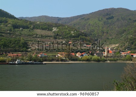 Austria, barge on Danube river in the Unesco World Heritage of Danube Valley