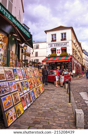 PARIS - August 16: Streets of Montmartre hill are full of art galleries, cafes and shops on August 16, 2014 in Paris, France. Montmartre area is among most popular destinations in Paris