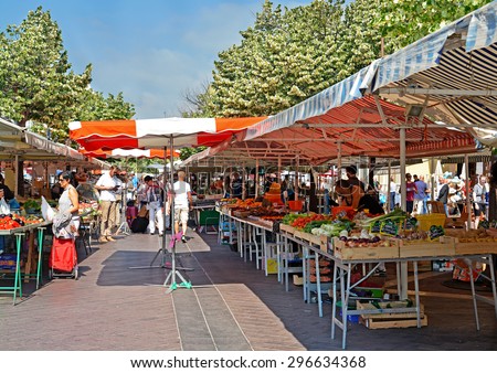 NICE, FRANCE - JUNE 3, 2015: Cours Saleya at the French Riviera famous street market in Nice, Cote d\'Azur, France
