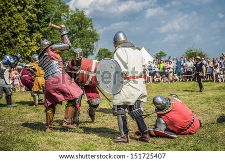 LIW, POLAND 17 AUGUST: Members of Medieval Reenactment Order fight in Liw Tournament on 17 August 2013 in Liw, Poland