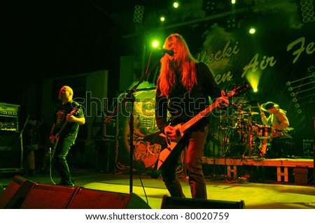 SIEDLCE, POLAND - JUNE 26: Acid Drinkers performs on stage at Siedlecki Rock Open Air Festival on June 26, 2011 in Siedlce, Poland