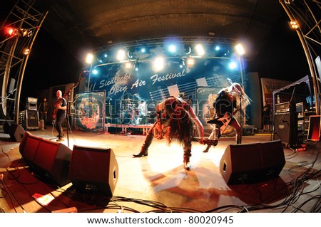 SIEDLCE, POLAND - JUNE 26: Acid Drinkers perform on stage at Siedlecki Rock Open Air Festival on June 26, 2011 in Siedlce, Poland