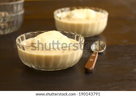 Floating Island, a European dessert of French origin called Oeufs a la neige in French, in Hungarian Madartej (Bird\'s Milk) (Selective Focus, Focus on the front of the egg white foam)