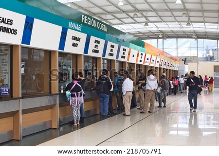 QUITO, ECUADOR - AUGUST 8, 2014: Unidentified people standing in line to buy bus tickets for long-distance buses at the Terminal Terrestre Quitumbe on August 8, 2014 in Quito, Ecuador