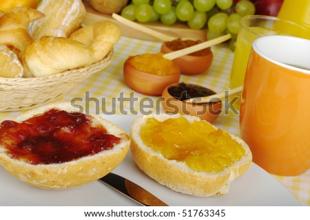 Jam breakfast with orange juice, coffee and fruits