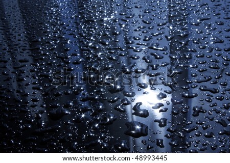 Abstract background with drops in back lit