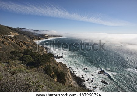 Scenic hwy 1 along Big Sur, California, the fog is trying to come in along the shoreline