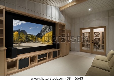 home theater with wine tasting room, big screen, wood cabinets,photo on screen is one of my shots from yosemite