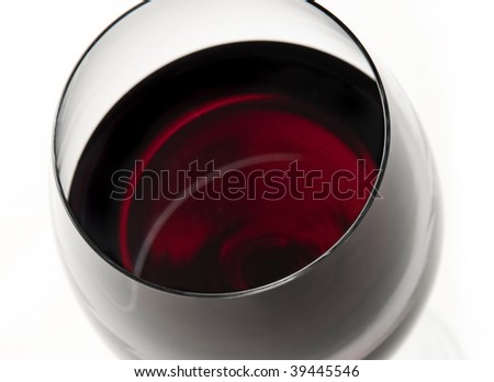 stock photo : wine glass on white background, beautiful red color, merlot 