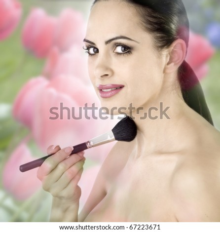 collage of woman with makeup brush, bare skin, feathered over field of pink tulips