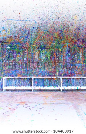 Paint splattered wall in an art studio, also available in horizontal.