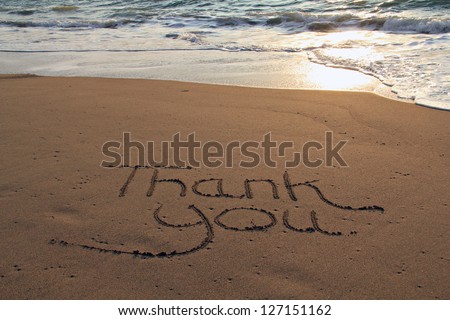 Thank You Written In The Sand On The Beach.