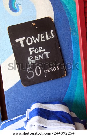 Towels for rent sign in Sayulita, Mexico.
