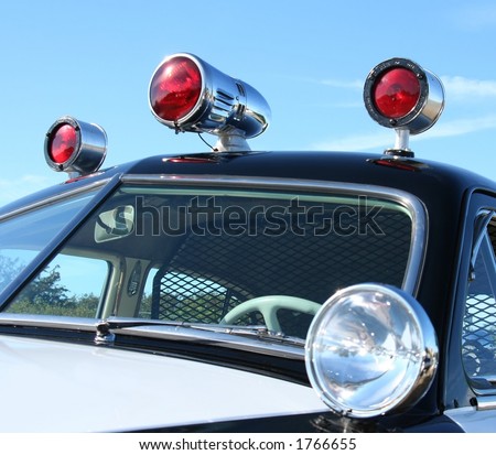 Vintage police car sirens.