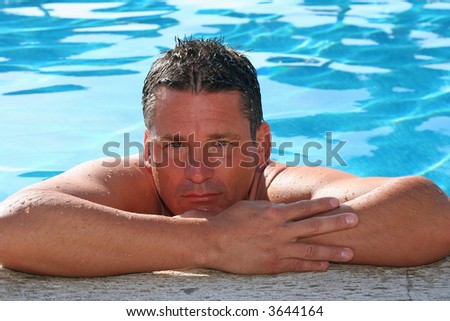 Handsome man in the pool