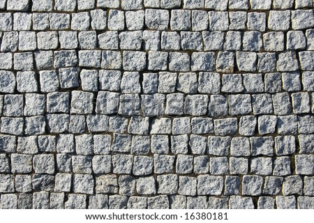stock-photo-old-grey-square-brick-wall-16380181.jpg