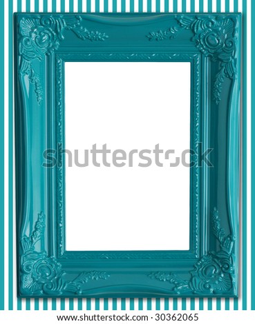 Contemporary blue picture frame on a striped wallpaper background.