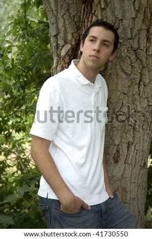 Young Man In Front Of Tree
