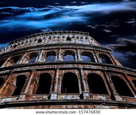 Ancient Roman Colosseum at night in the moonlight