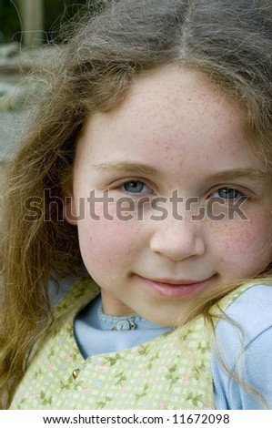close up of girl with freckles