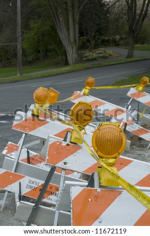 construction signs and yellow tape