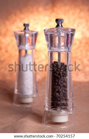 Salt and pepper grinders. Focus on pepper.
