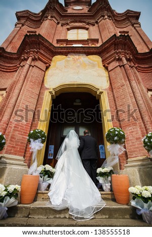entrance of the spouse in church with the father